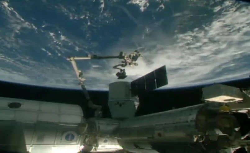 Dextre busy at work removing CRS-14 Dragon payloads