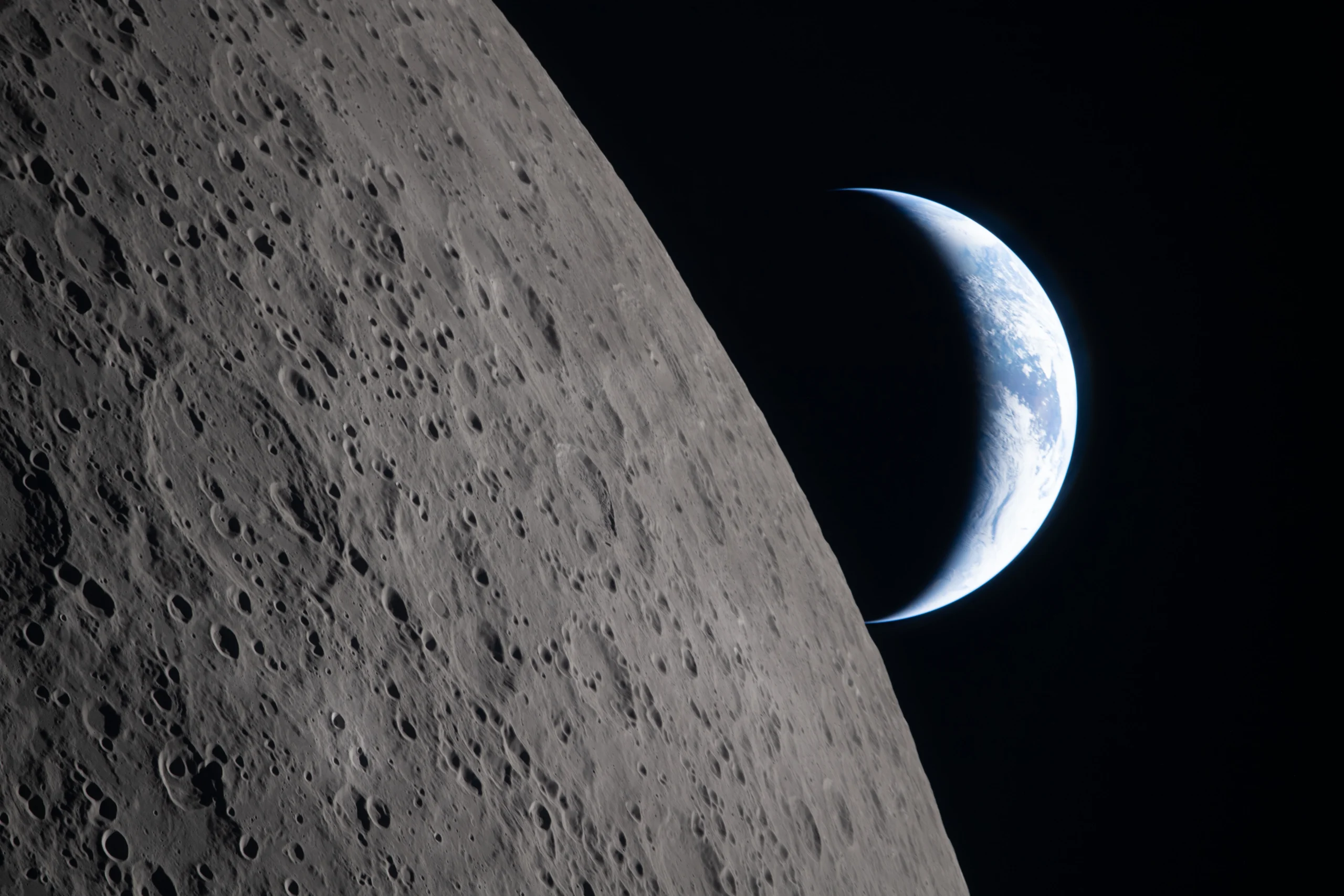 Astronauts set distance record, revealing the Moon as a place to be explored