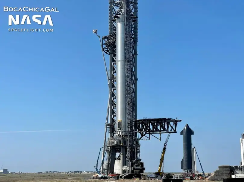 Booster 4 returns to the Launch Mount ahead of test campaign